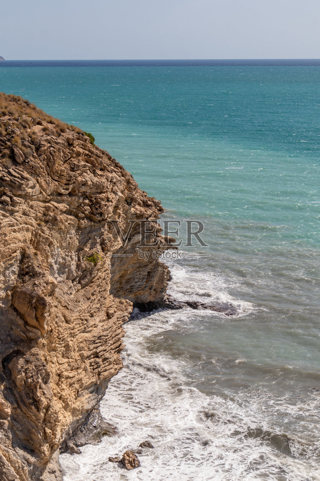 悬崖、海滩和大海照片摄影图片