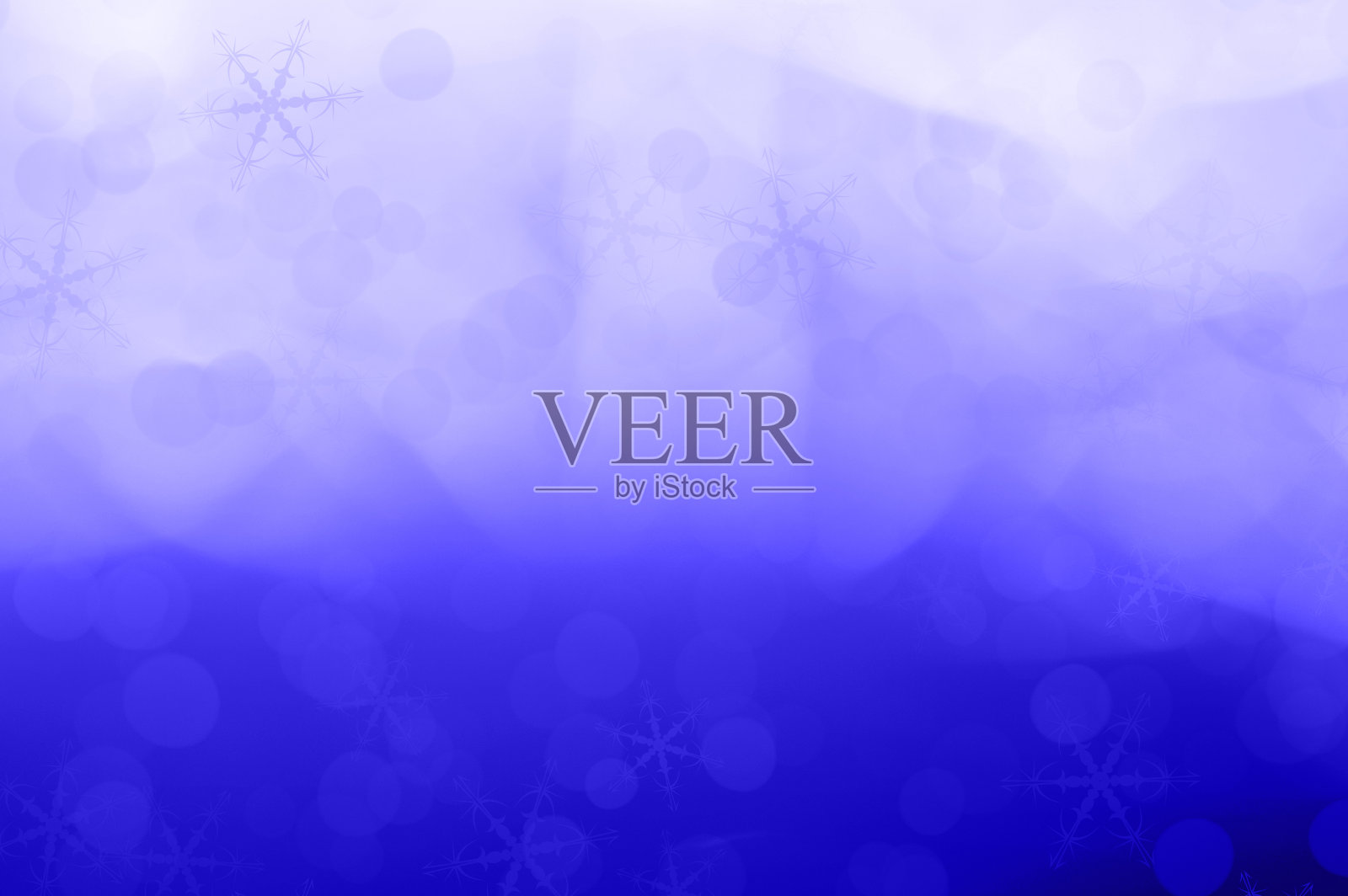 圣诞背景与雪花和雪在蓝色的背景照片摄影图片