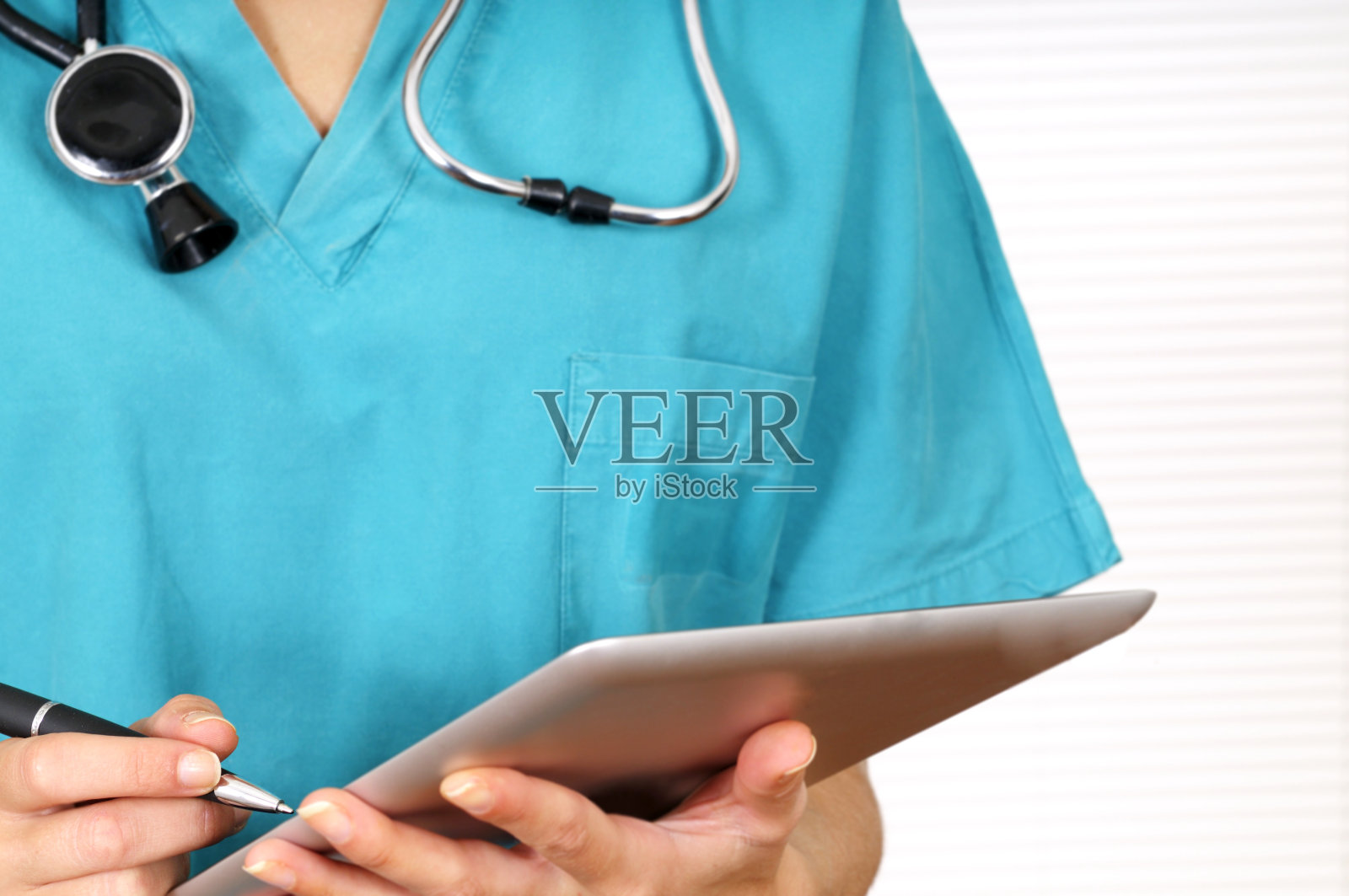 只需轻按即可轻松访问所有患者数据。照片摄影图片