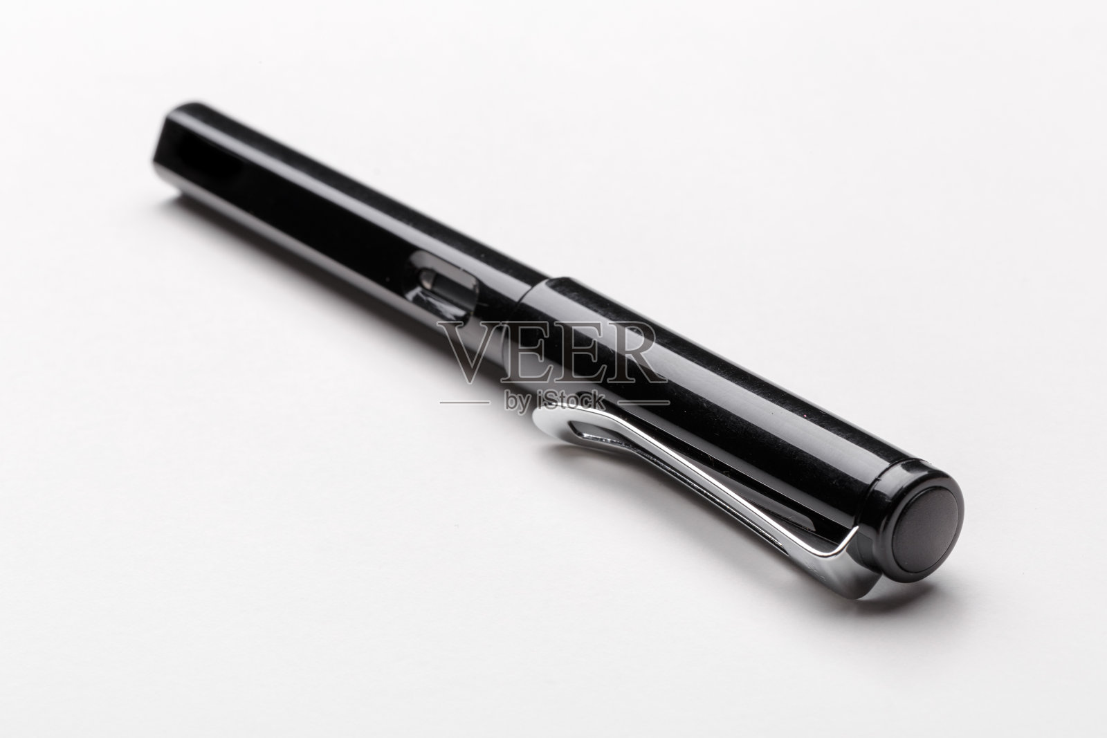 白色背景上的钢笔照片摄影图片