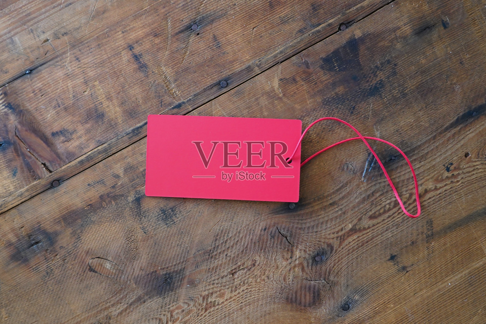 红色标签与字符串照片摄影图片