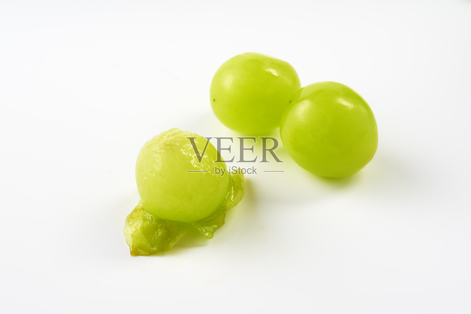 亮麝香水果在白色背景照片摄影图片