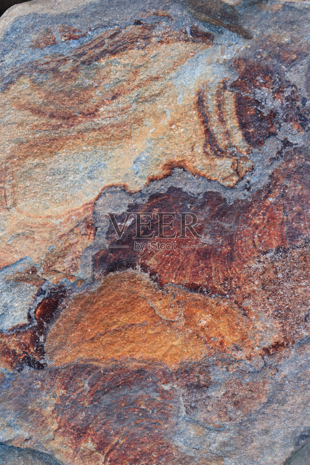 沉积岩的内层结构。石头的背景。照片摄影图片