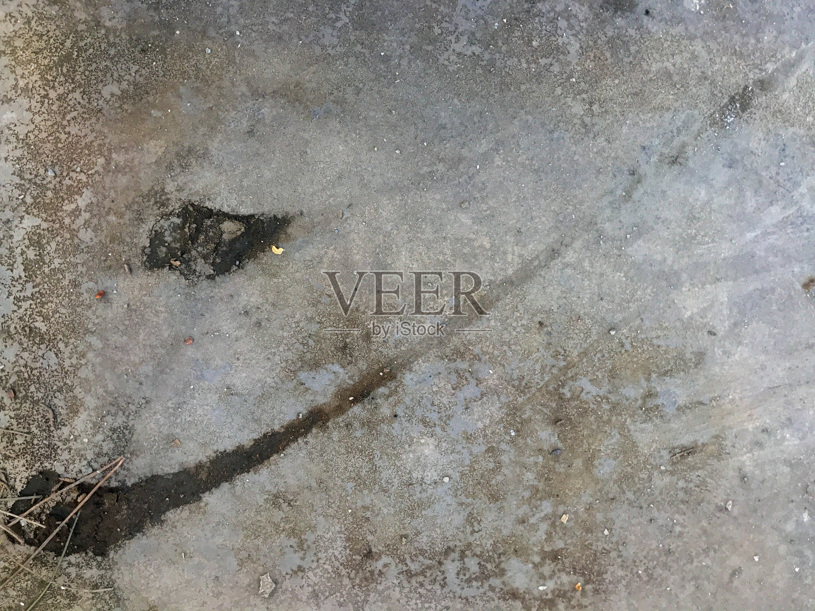 灰色水泥表面背景上的泥痕纹理视图照片摄影图片