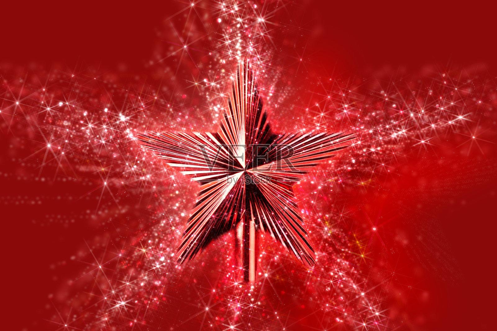 圣诞装饰。红星配上红色的灯光和背景照片摄影图片