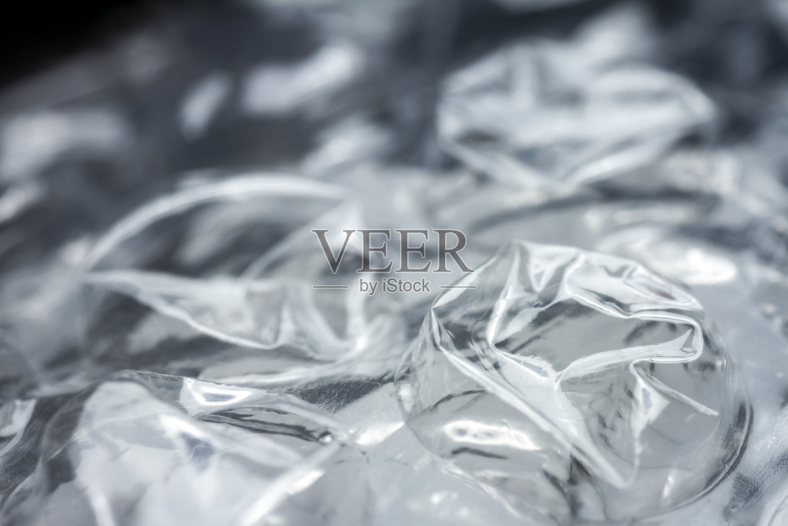 塑料气泡膜纹理的极端微距照片照片摄影图片