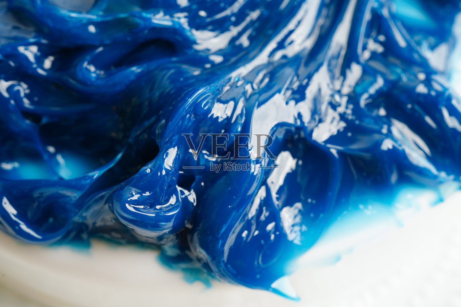 润滑脂，蓝色优质合成锂复合润滑脂，汽车和工业的高温和机械润滑。照片摄影图片