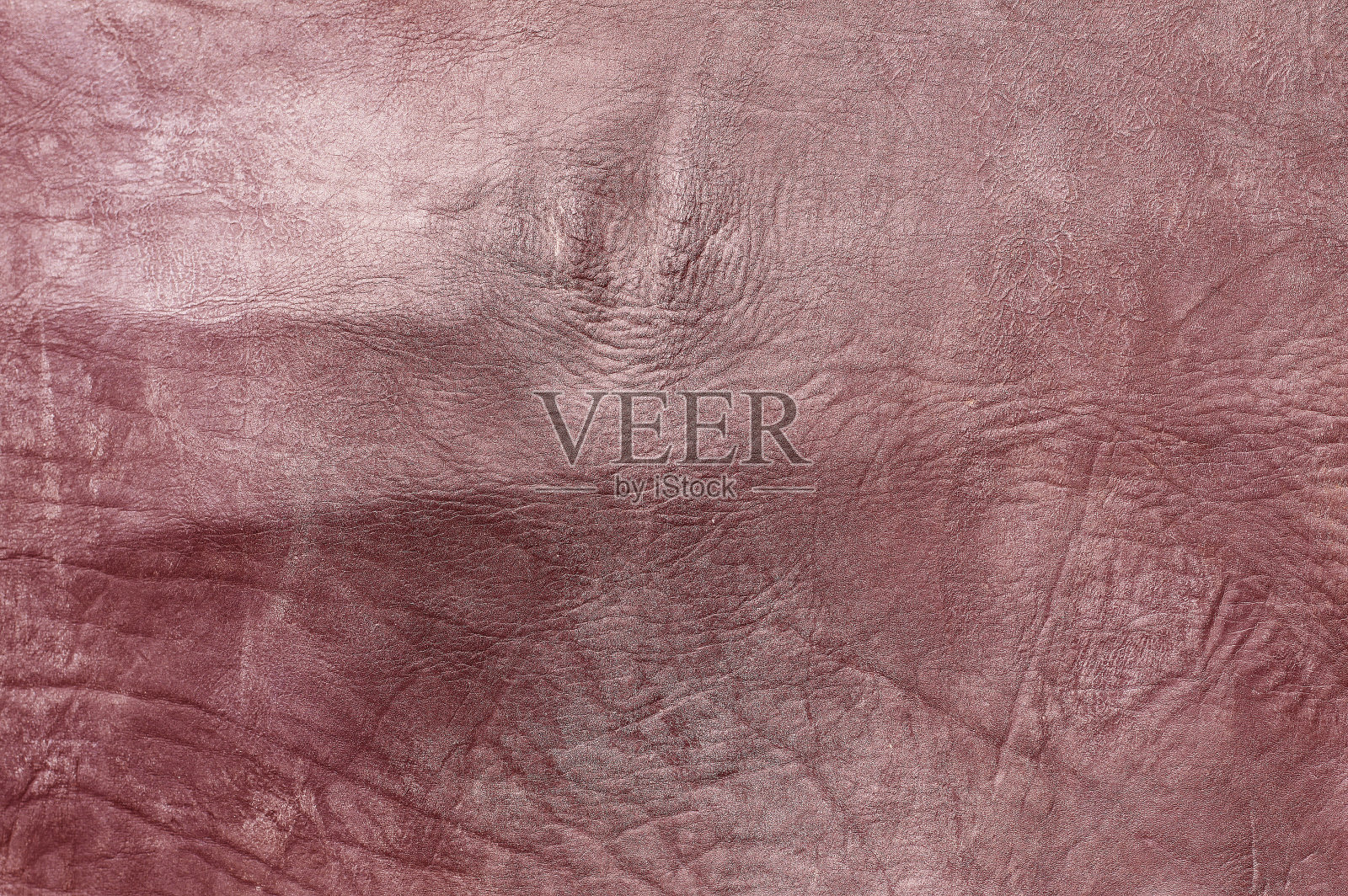 美丽的红色背景与皮革纹理与红色皮革的红色纹理作为红色背景的样本从天然皮革或皮革纹理的样本照片摄影图片