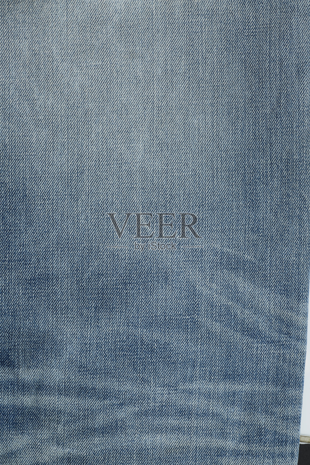 蓝色牛仔的质地和背景。照片摄影图片