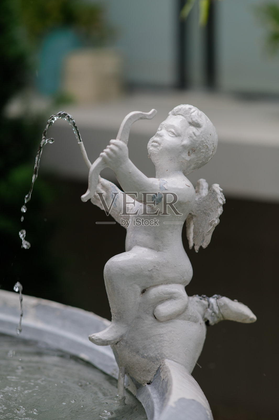 爱神丘比特的雕像孤立无援照片摄影图片