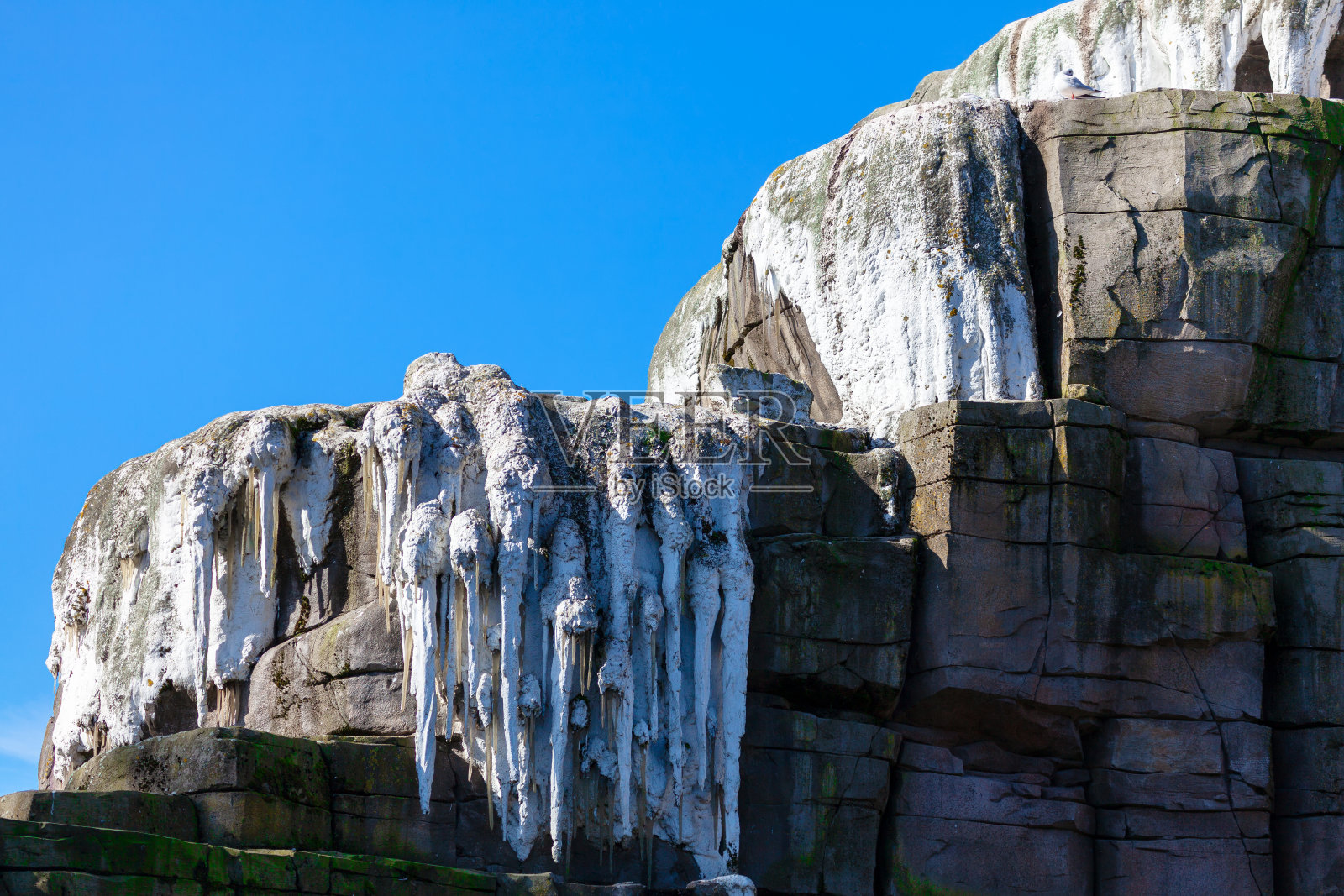 山顶上的冰柱照片摄影图片