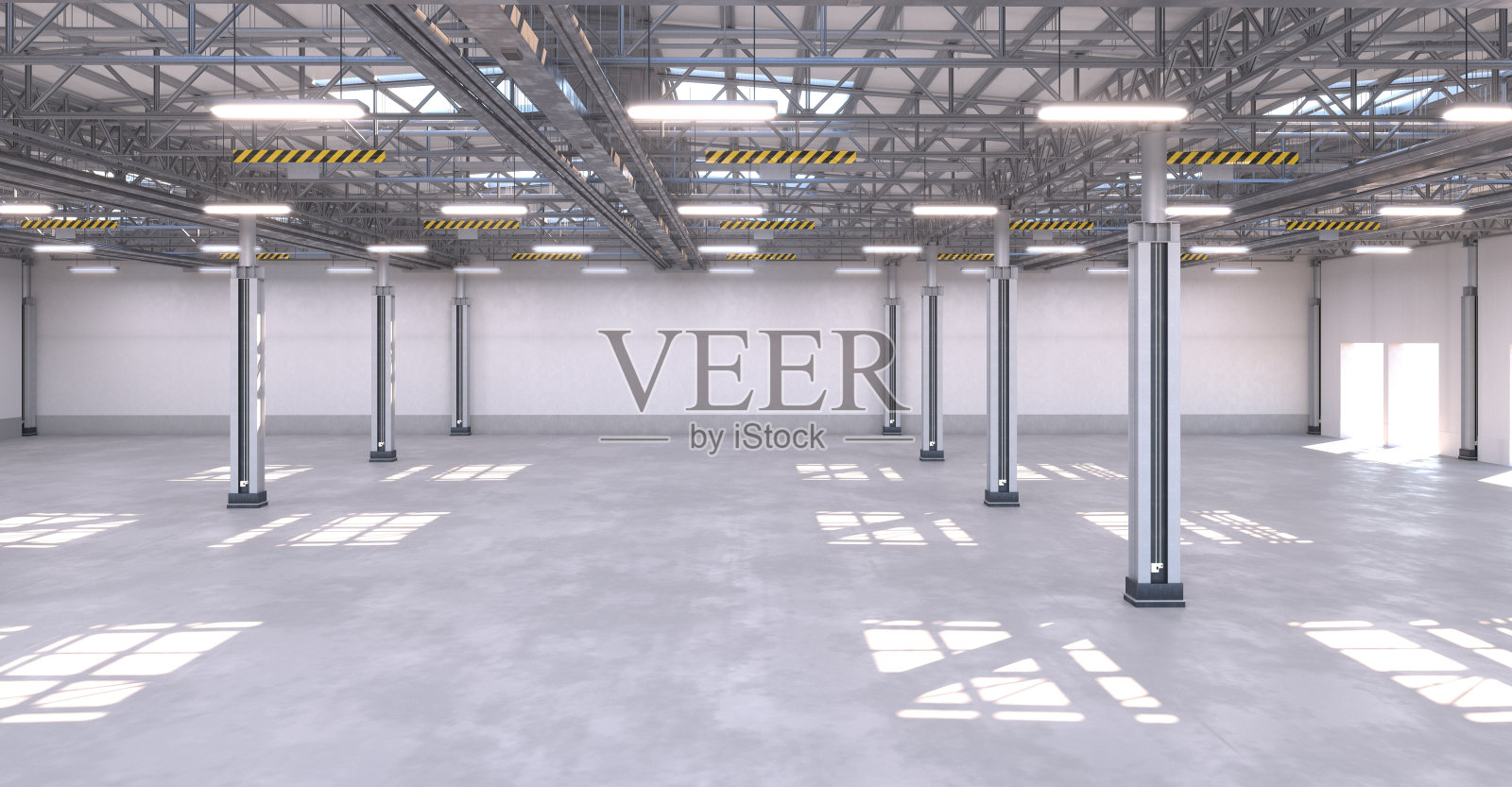 宽敞的空仓库，明亮的灯光照片摄影图片