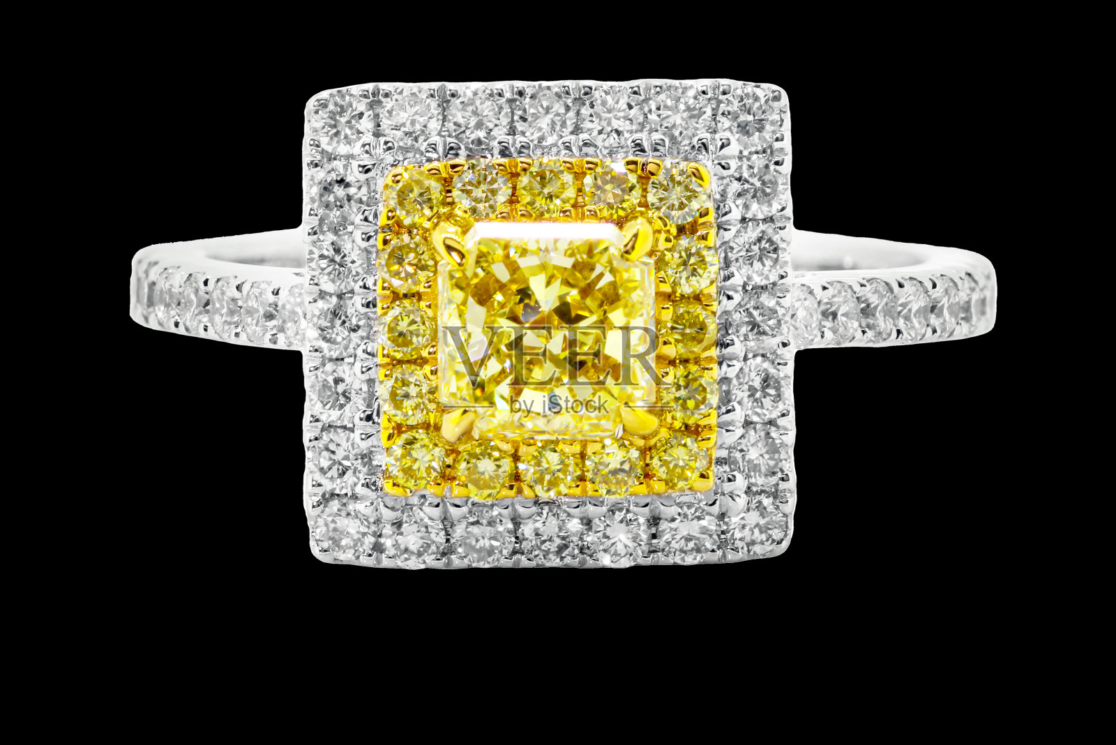 黄色蓝宝石戒指与钻石和宝石，珠宝在白色黄金与宝石照片摄影图片