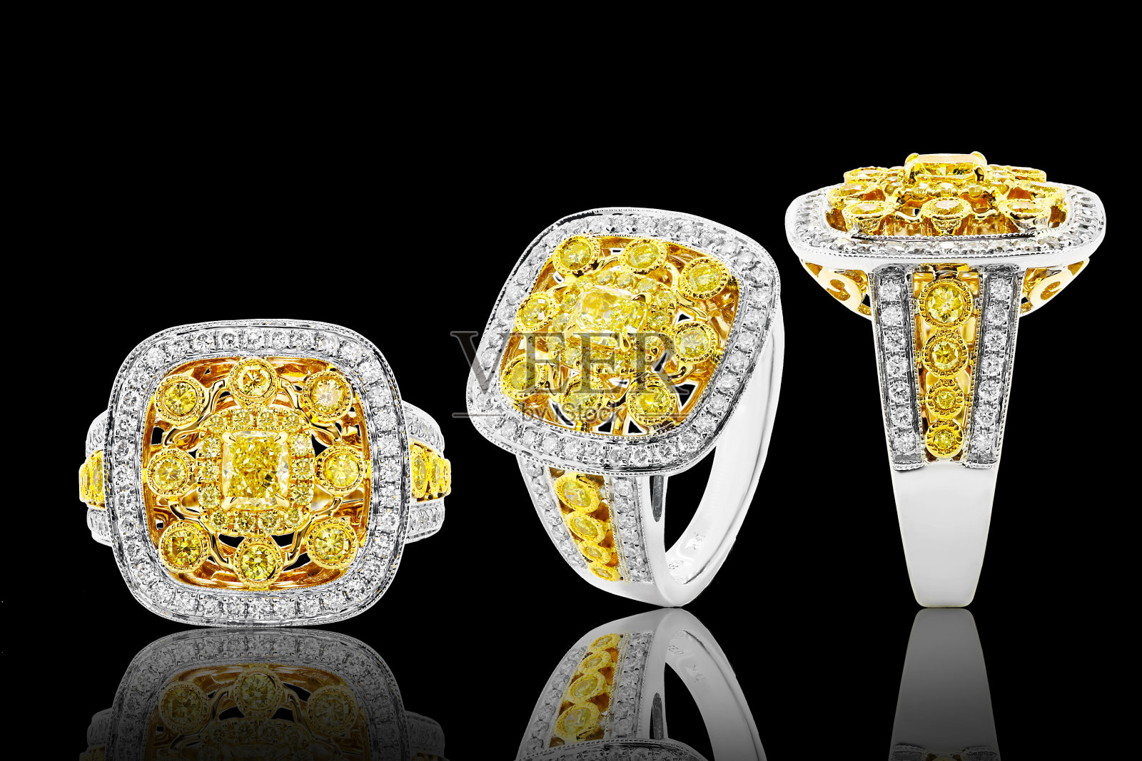 黄色蓝宝石戒指与钻石和宝石，珠宝在白色黄金与宝石照片摄影图片