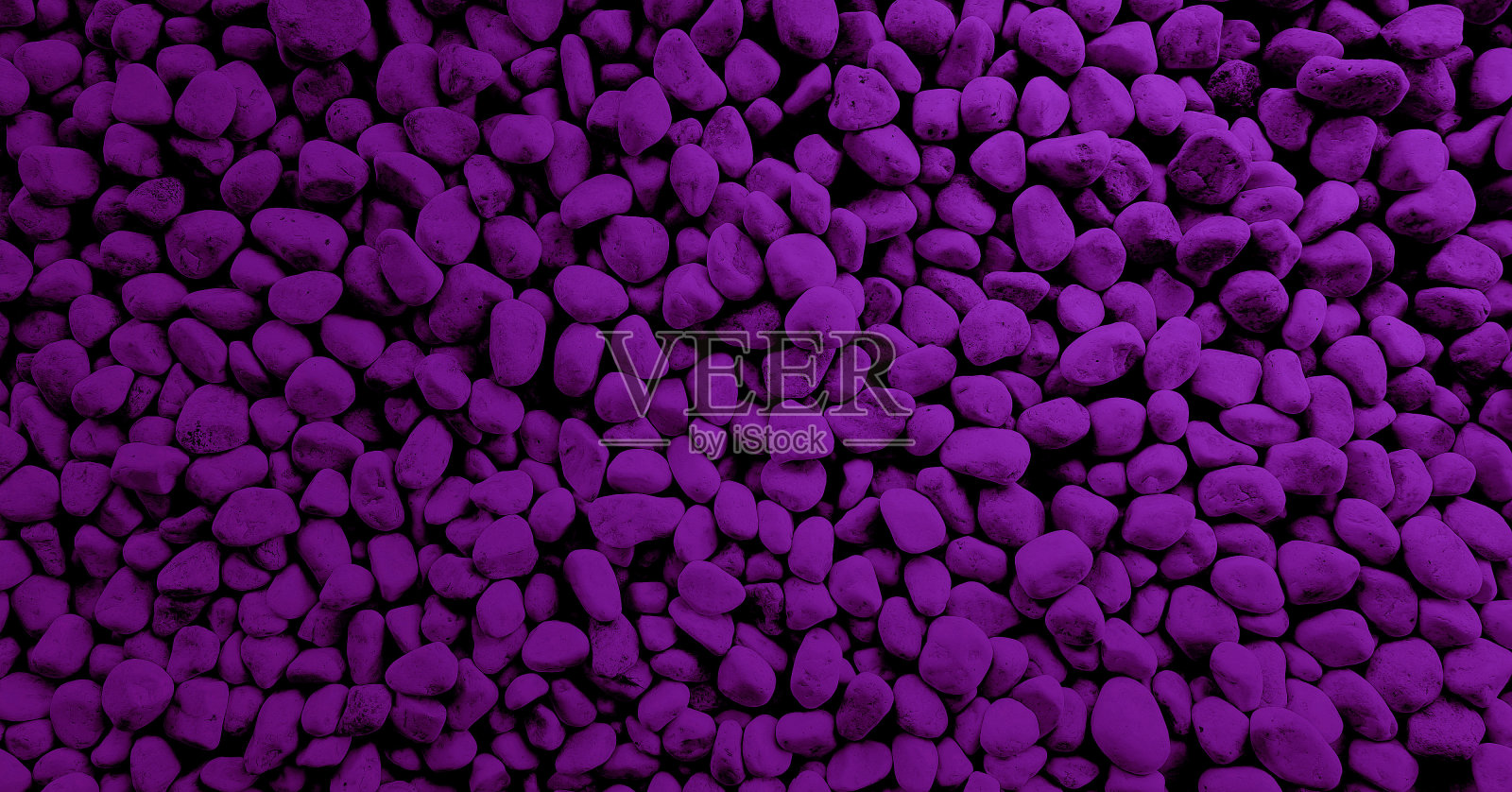 垃圾紫色鹅卵石质地地上的小石头日式禅意花园的抽象彩色碎石俯视图