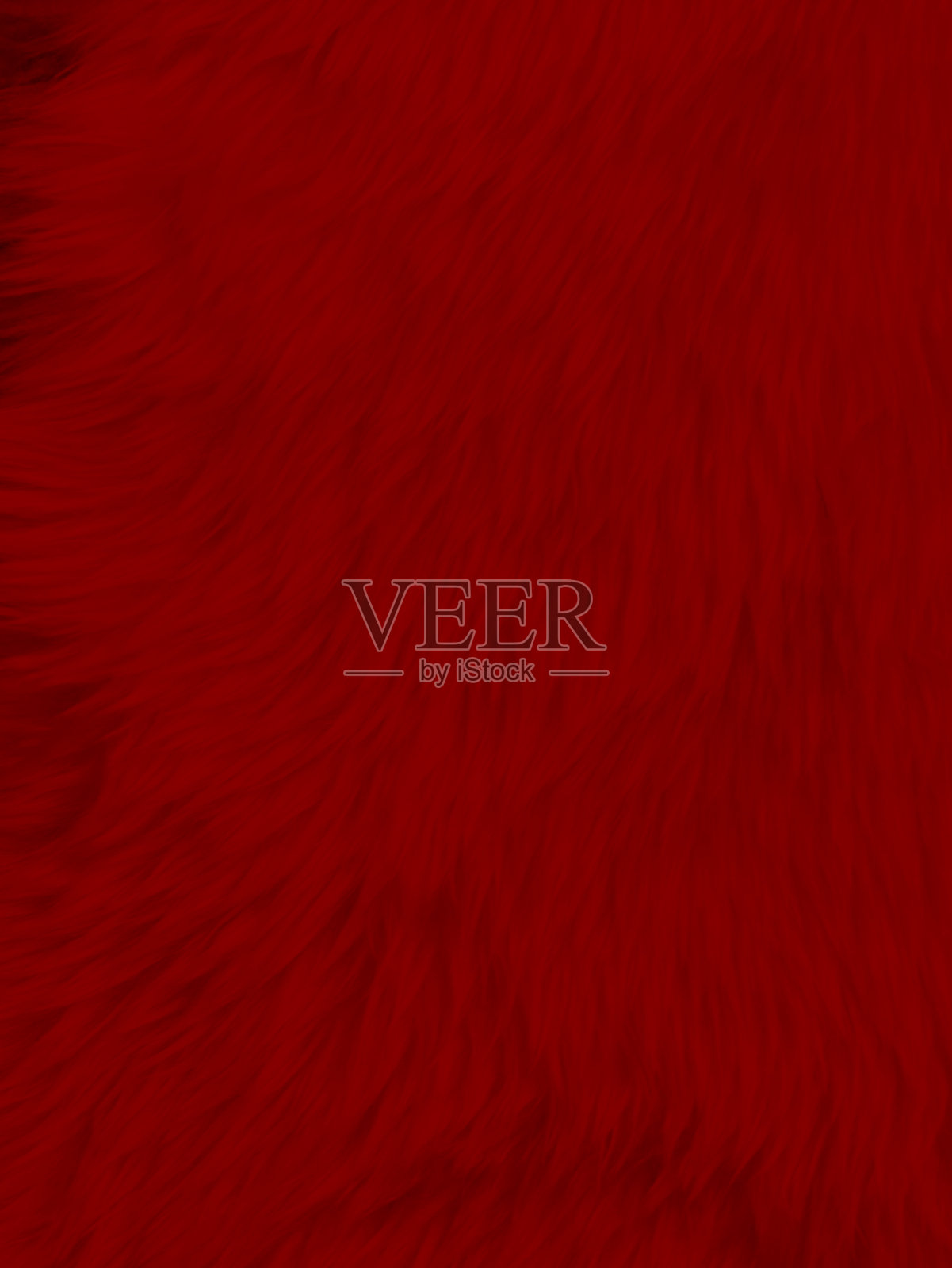 红色干净的羊毛质地背景。轻天然羊毛。红色的棉花。为设计师设计的毛茸茸的皮毛。特写片段圣诞羊毛地毯。照片摄影图片