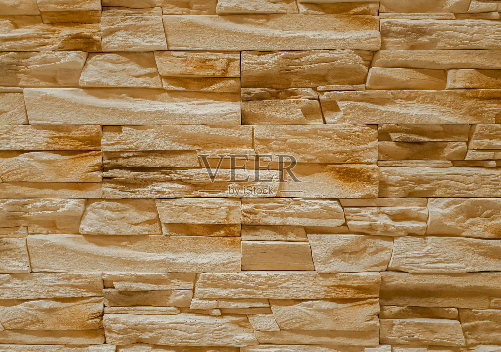 一个带有装饰性石墙的特写照片摄影图片