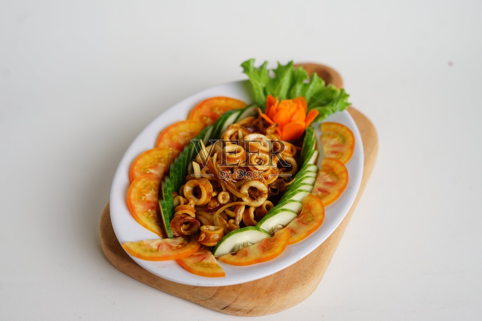 麻辣炒鱿鱼照片摄影图片