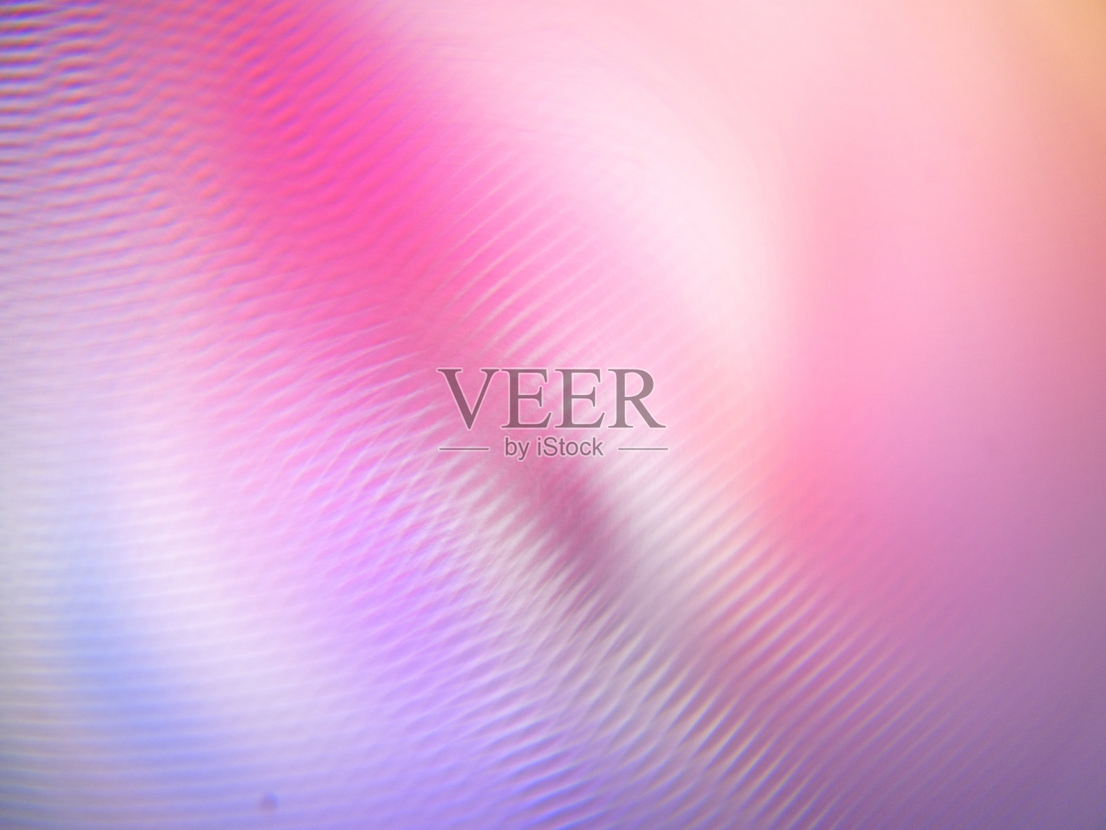 抽象背景交错，折射，斑驳的粉色光层和漩涡照明效果照片摄影图片