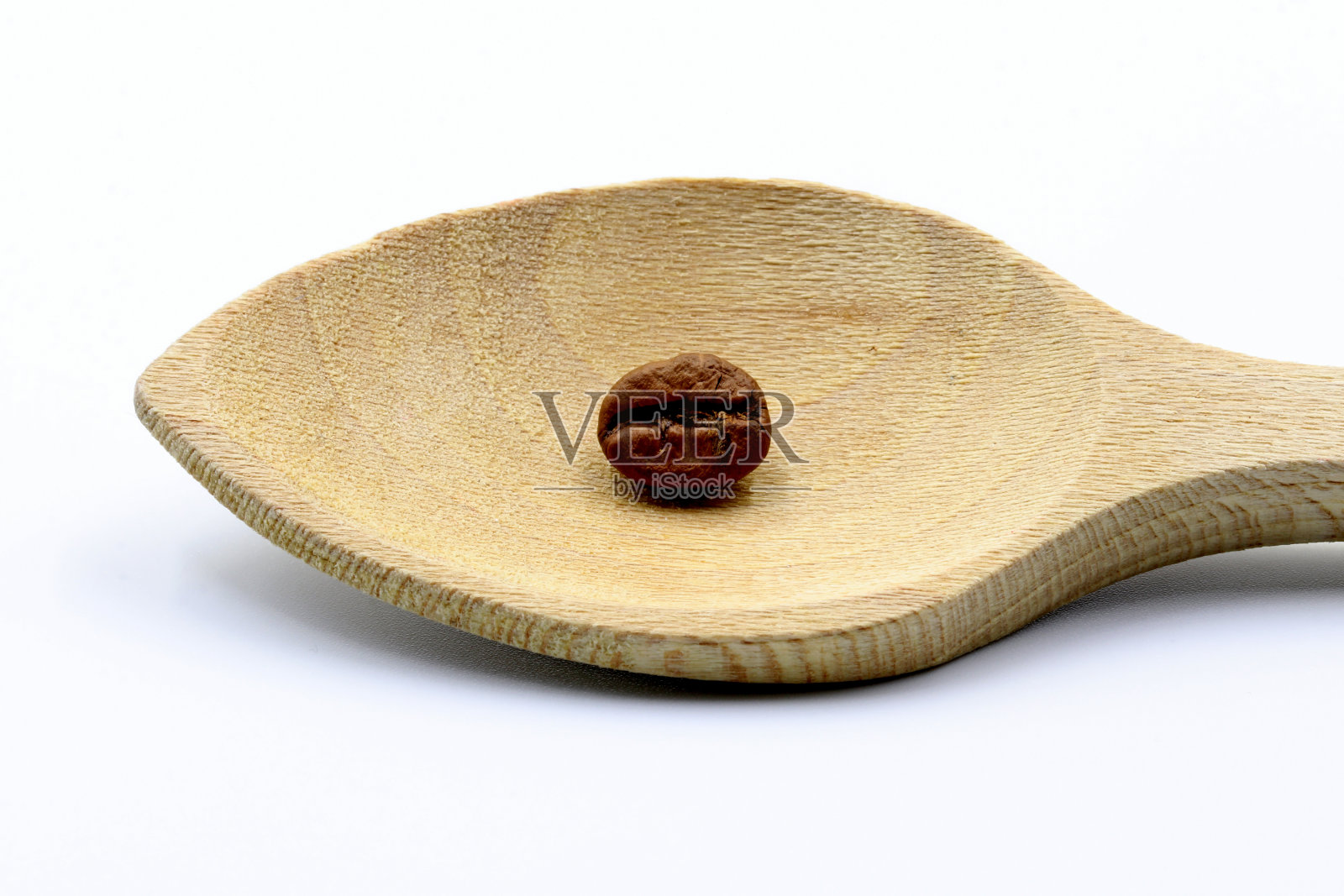 木匙上的咖啡豆照片摄影图片