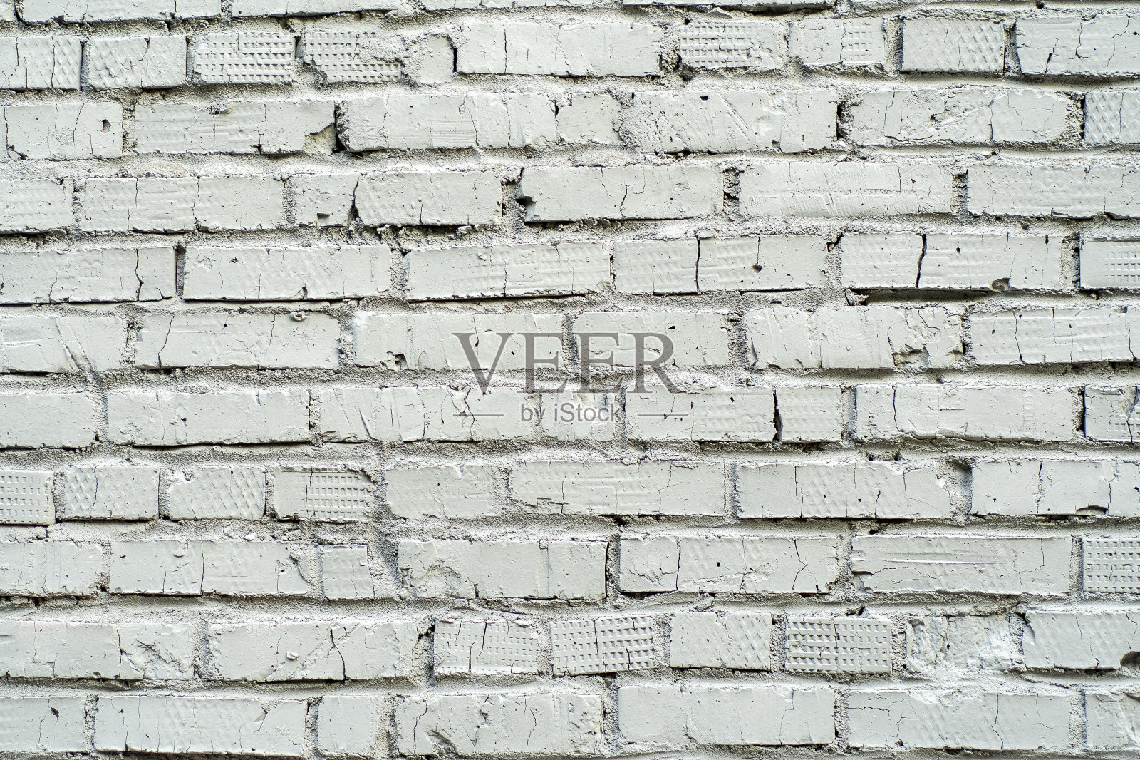 白砖砌成的墙。背景与墙漆白色。照片摄影图片
