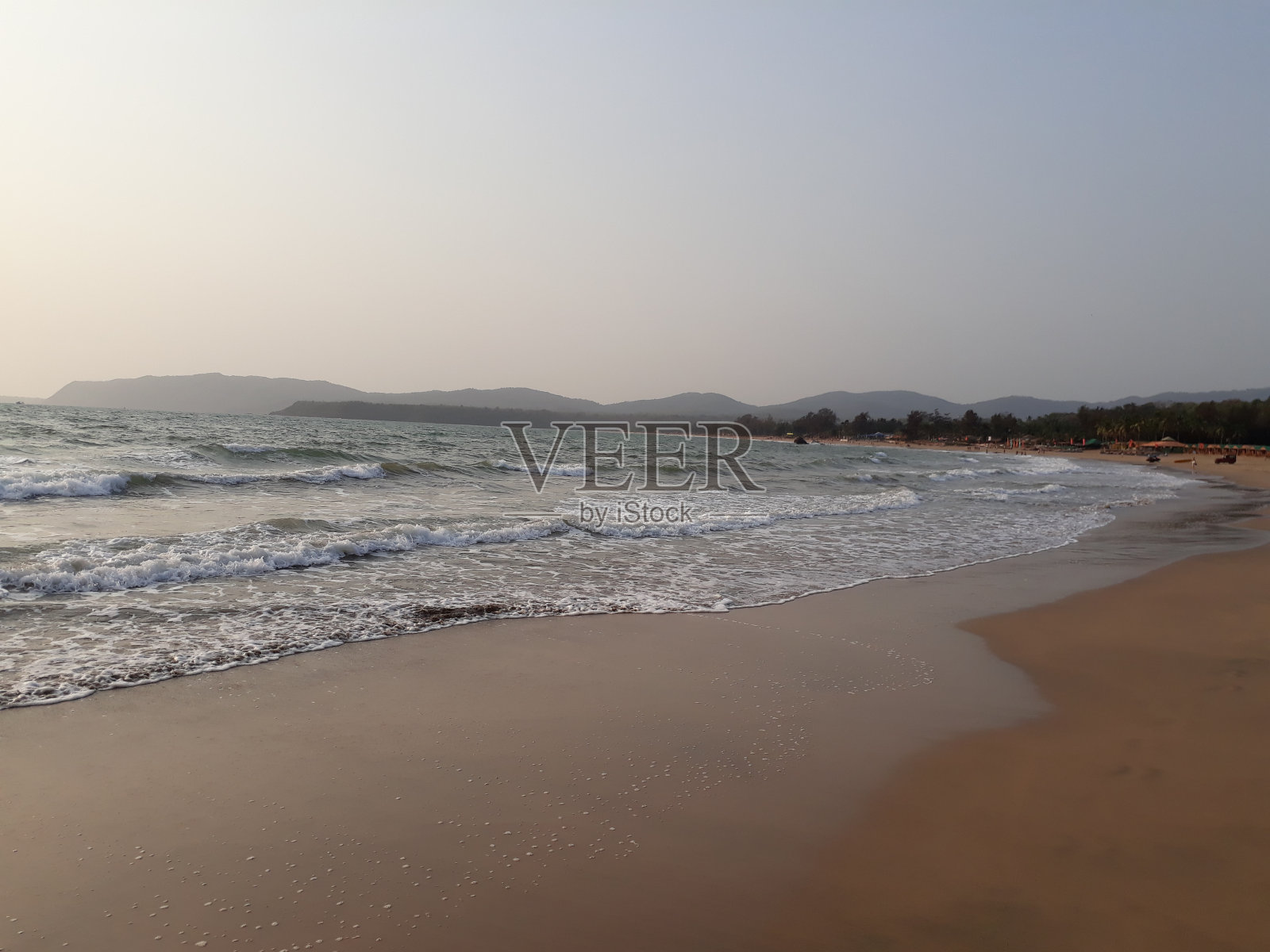 果阿邦的阿贡达海滩。带天堂的热带海滩。果阿的阿拉伯海滩。果阿海滩。照片摄影图片