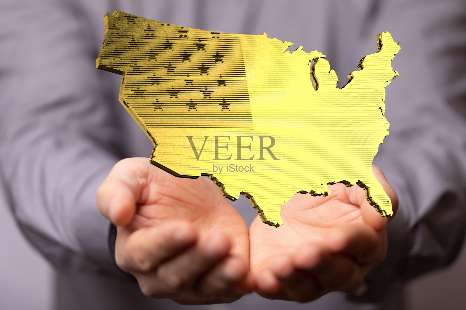 美国国旗在一个人的手上照片摄影图片