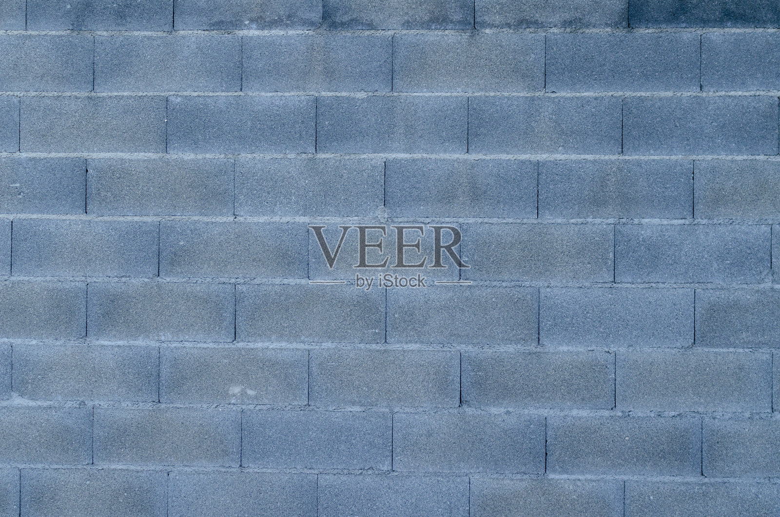 用水泥块砌成的墙照片摄影图片