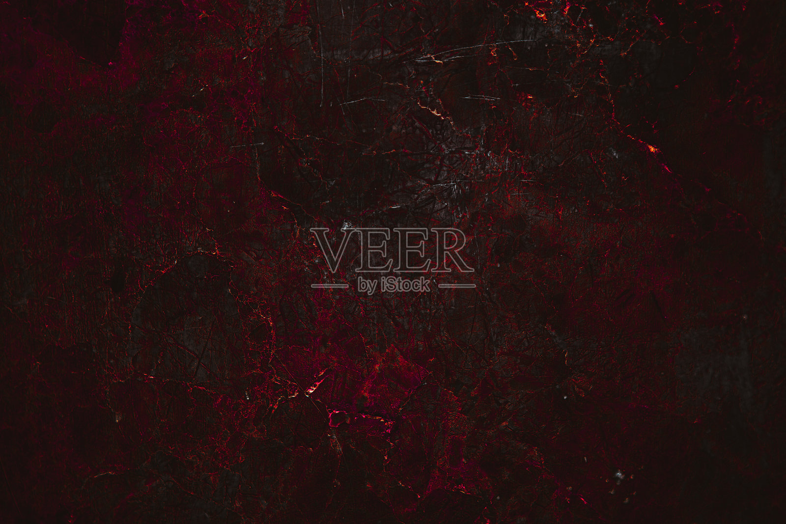 棕色的纹理。石头的背景。岩石纹理。枯燥乏味的粗糙结构。抽象的纹理。岩石表面有裂缝。岩石堆。墙漆点。大理石墙壁。照片摄影图片