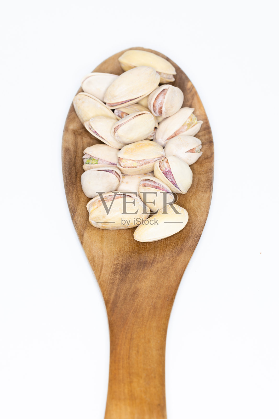 开心果可以在白色背景下吃照片摄影图片