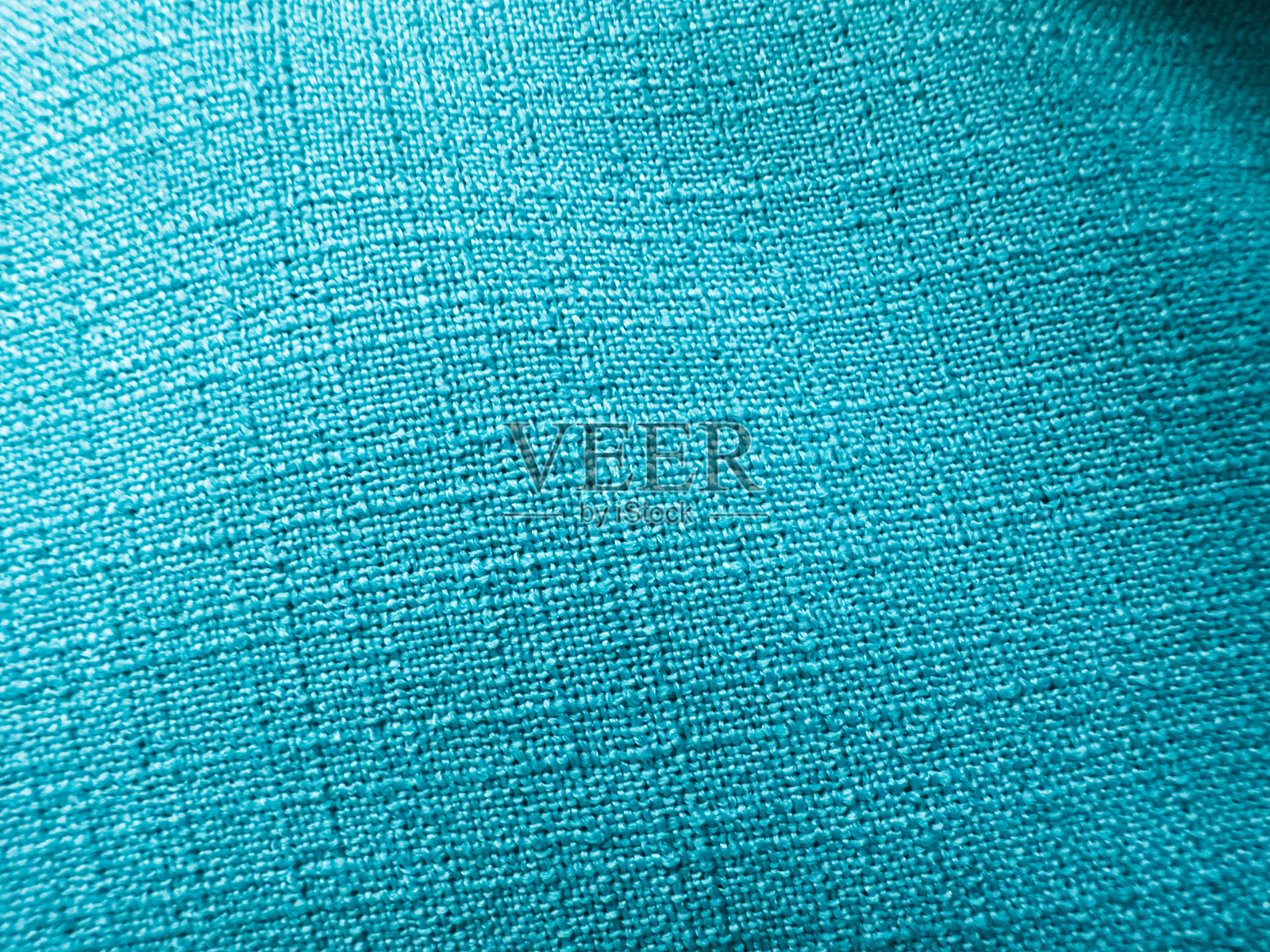 蓝色布料质地，微孔。宏照片摄影图片
