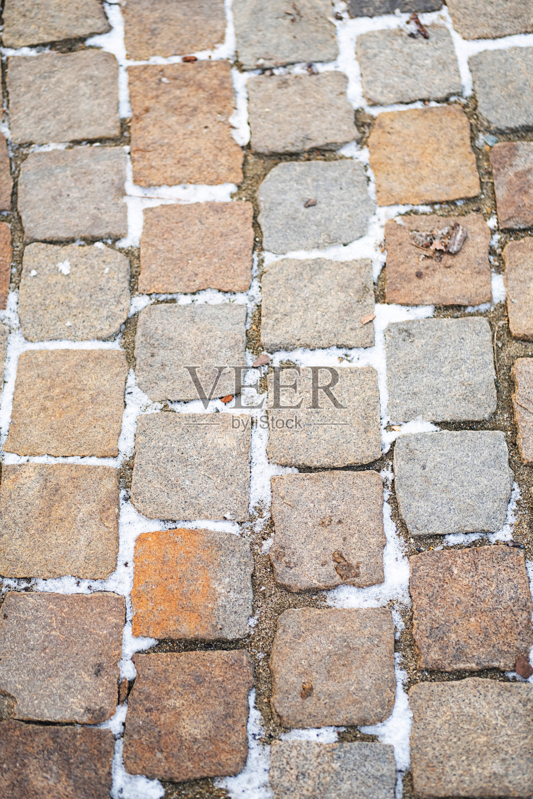 道路铺装石板图案。用石头铺成的路。照片摄影图片