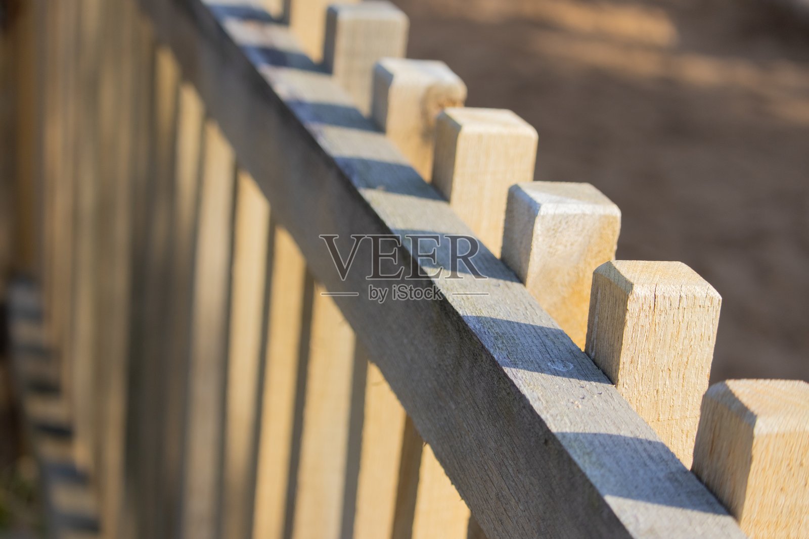 一个农场的木栅栏顶端的特写镜头照片摄影图片