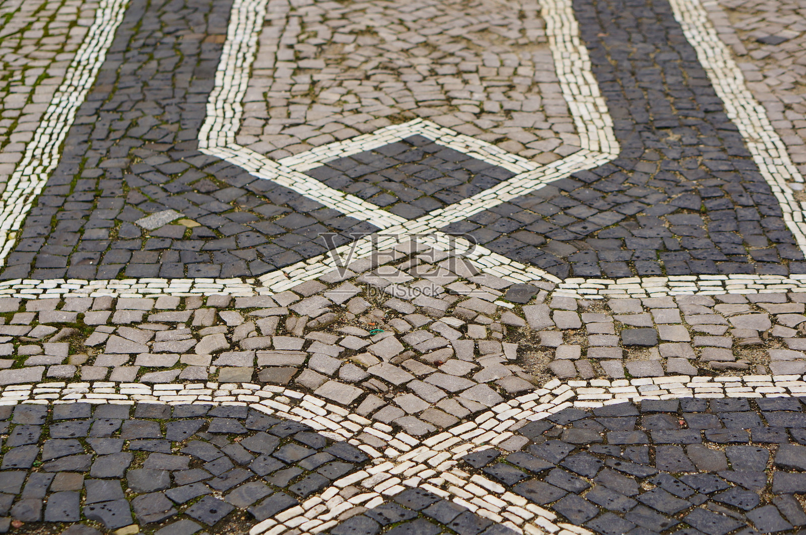 高角度特写的图案鹅卵石地面与瓷砖的不同颜色照片摄影图片