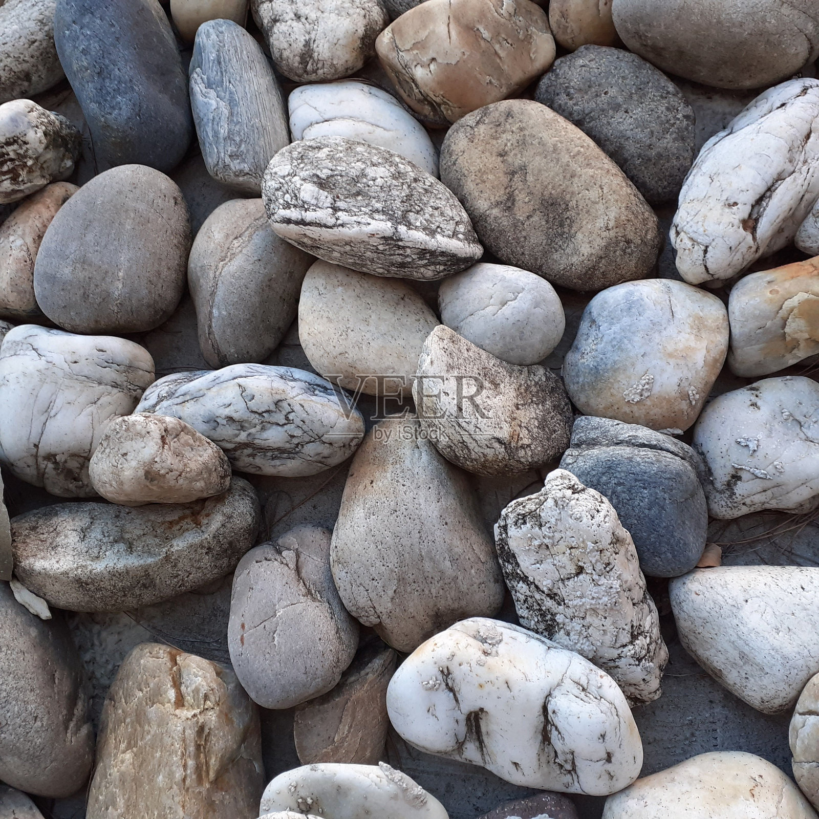 夏天沙滩上小石头的特写镜头照片摄影图片