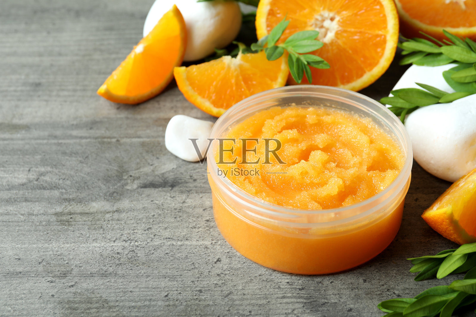 皮肤护理磨砂概念在灰色纹理背景照片摄影图片