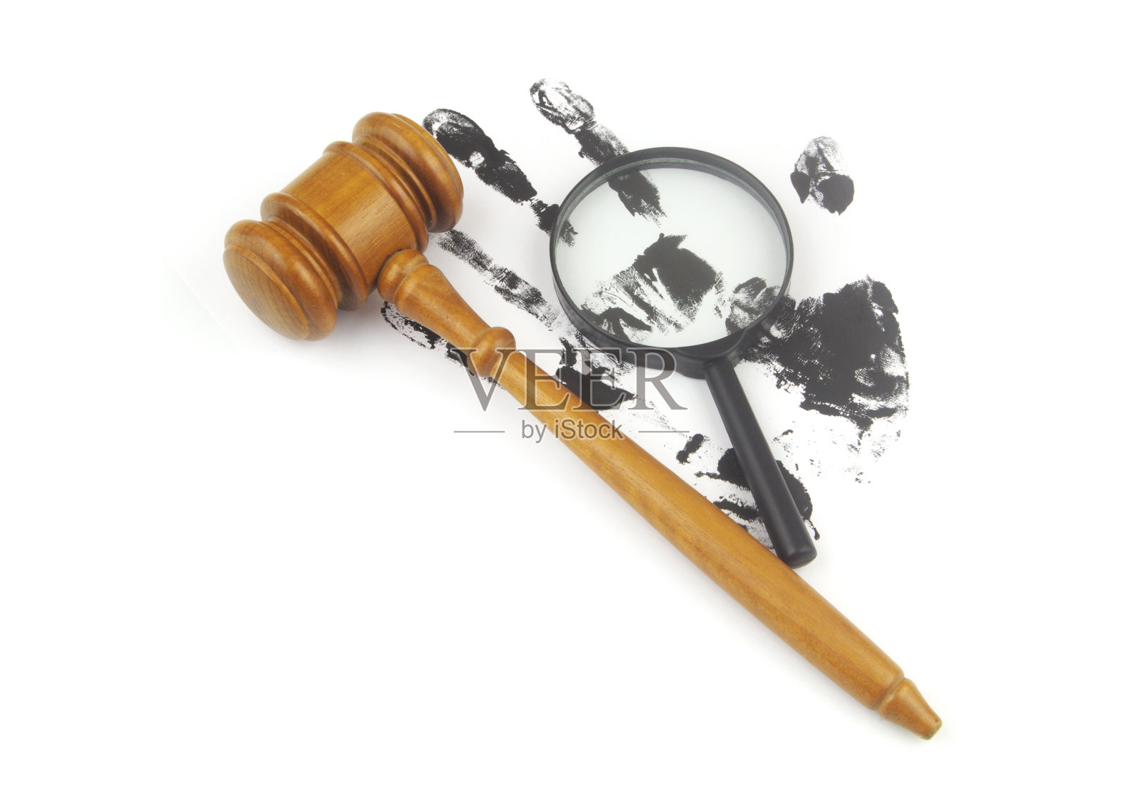 法官木槌，黑色放大镜，白色手印照片摄影图片