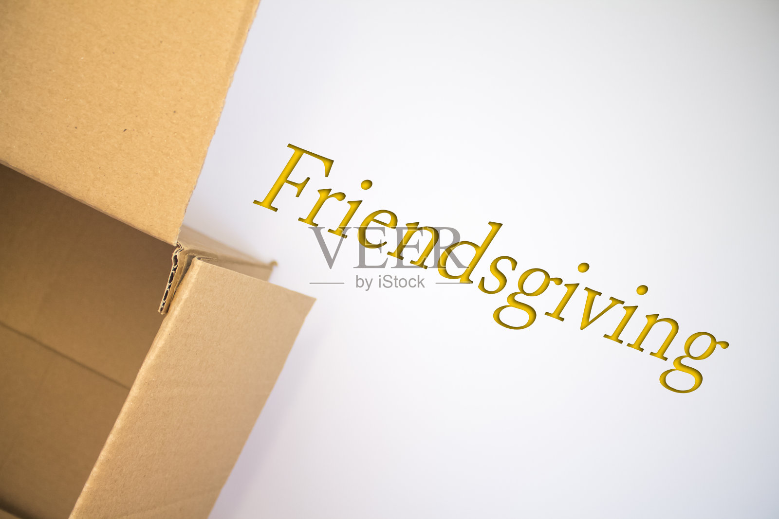 朋友的话语用纸板箱。棕色折叠卡片盒。照片摄影图片