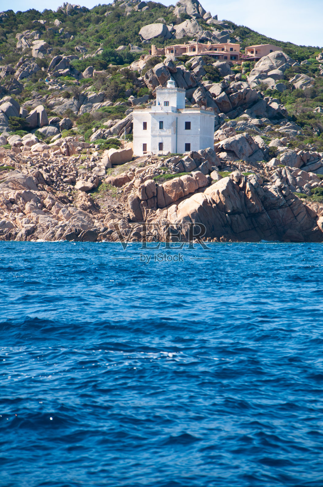 蓬塔法罗拉斐尔港的撒丁岛灯塔照片摄影图片