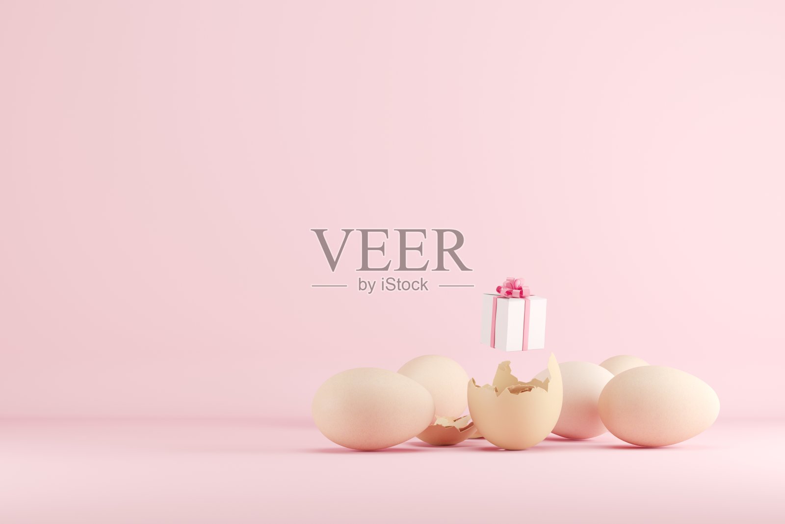 白色礼品盒上的彩色彩蛋在粉红色的背景。3 d渲染。简约的圣诞理念。副本的空间。照片摄影图片