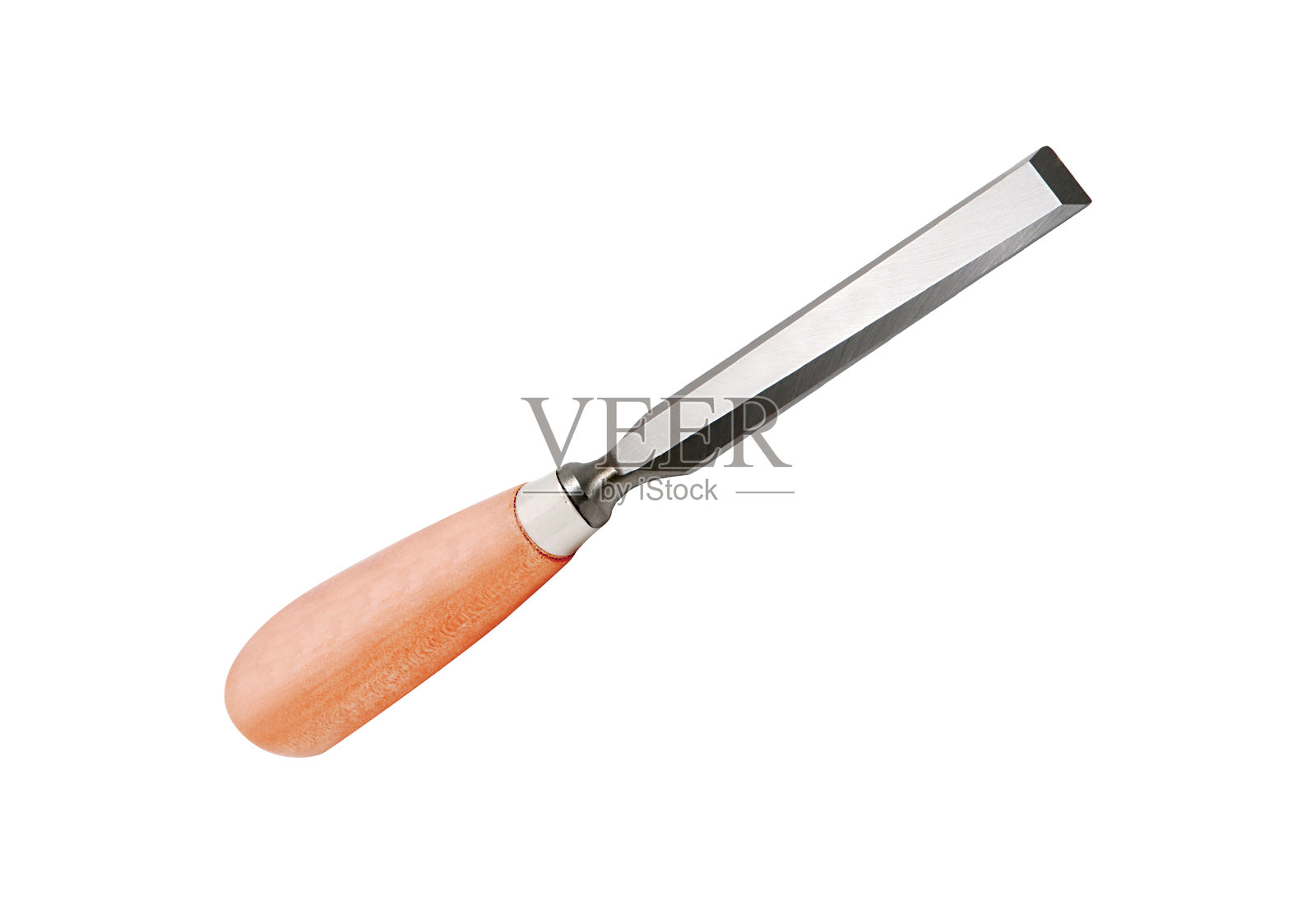 木匠的凿子凿在一块白色的石板上照片摄影图片