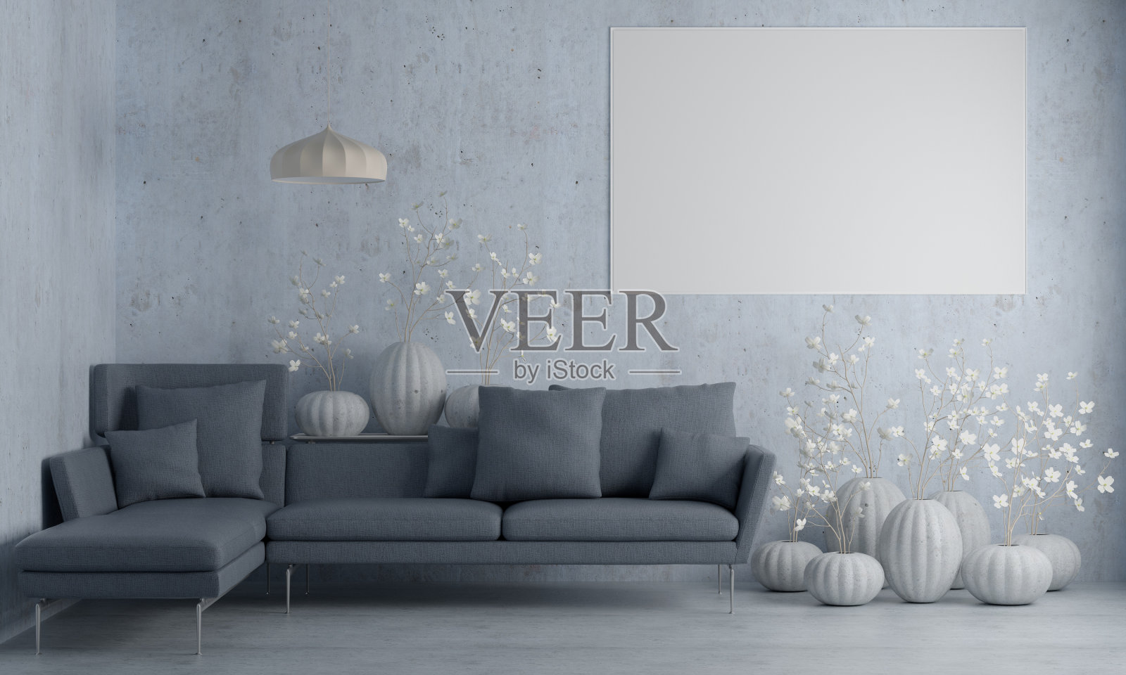 房间里有沙发，墙上有个相框。照片摄影图片