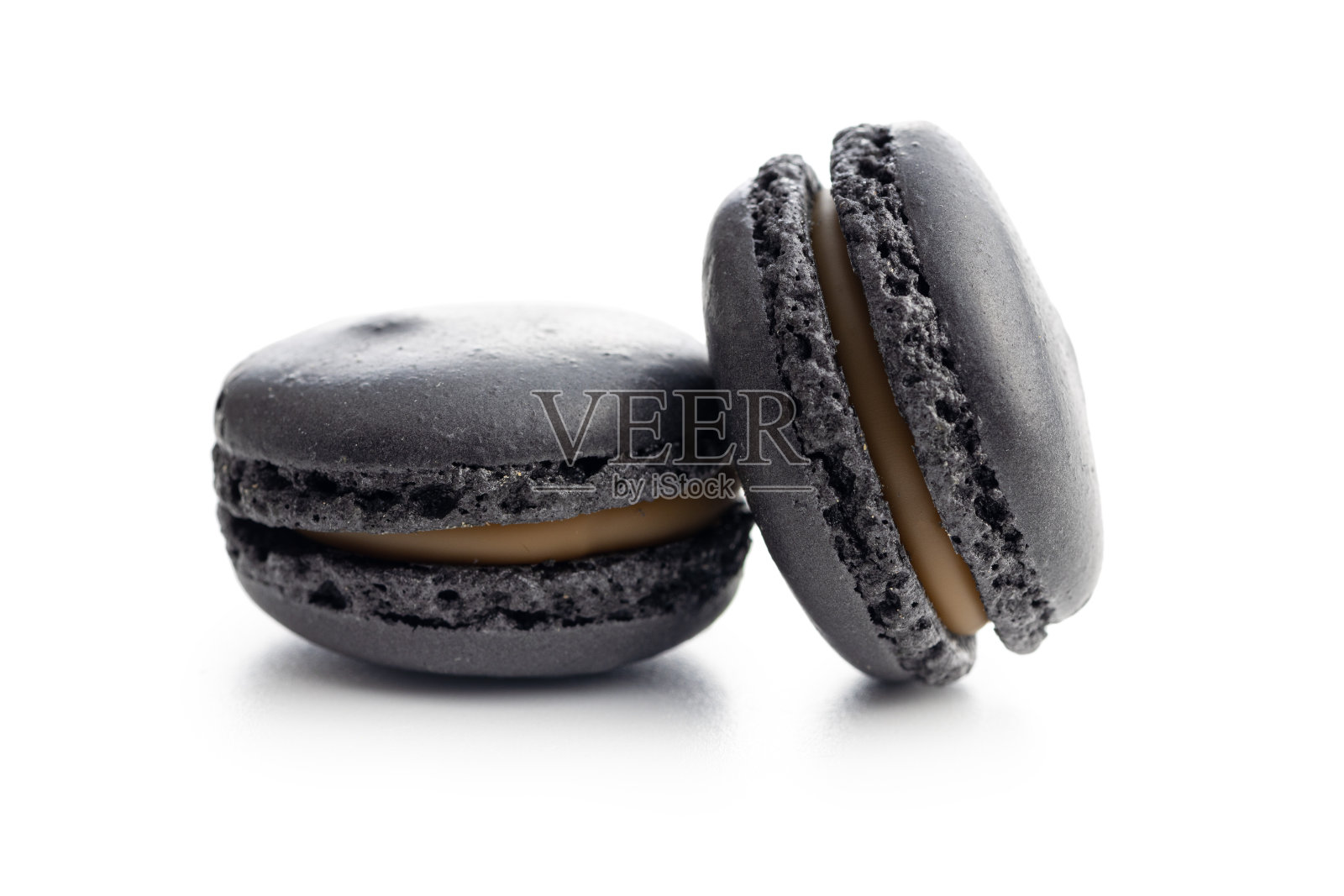 香甜的马卡龙甜点。白色背景下的马卡龙。照片摄影图片