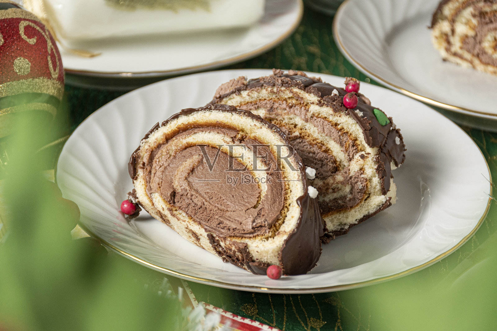 精选焦点镜头的美味圣诞海绵蛋糕片照片摄影图片