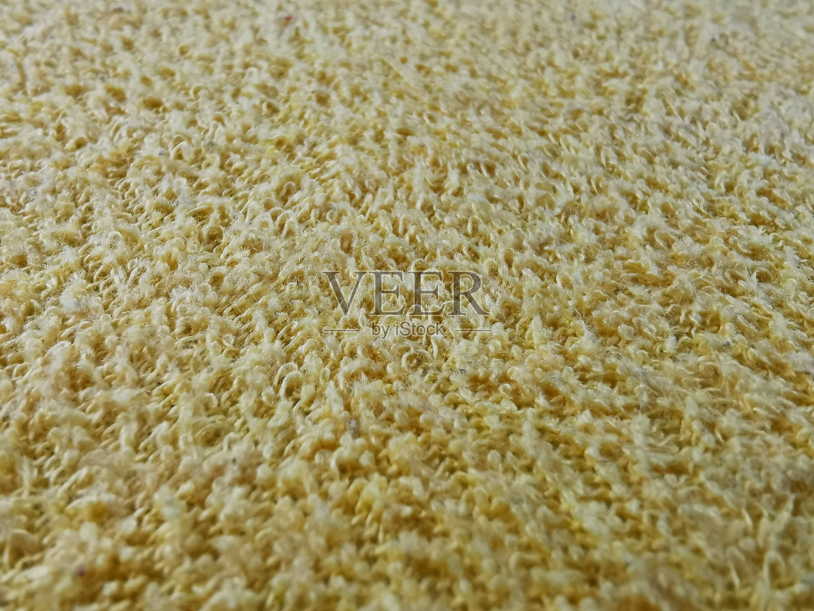 黄色毛圈织物的特写照片摄影图片
