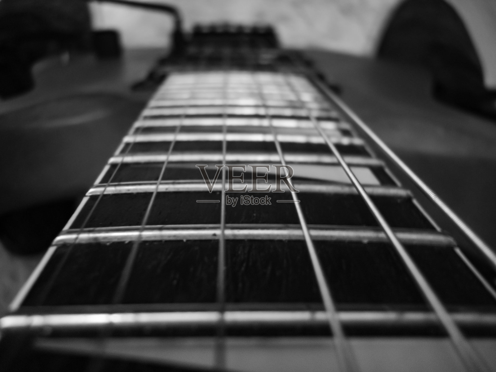 一个吉他脖子的抽象镜头照片摄影图片