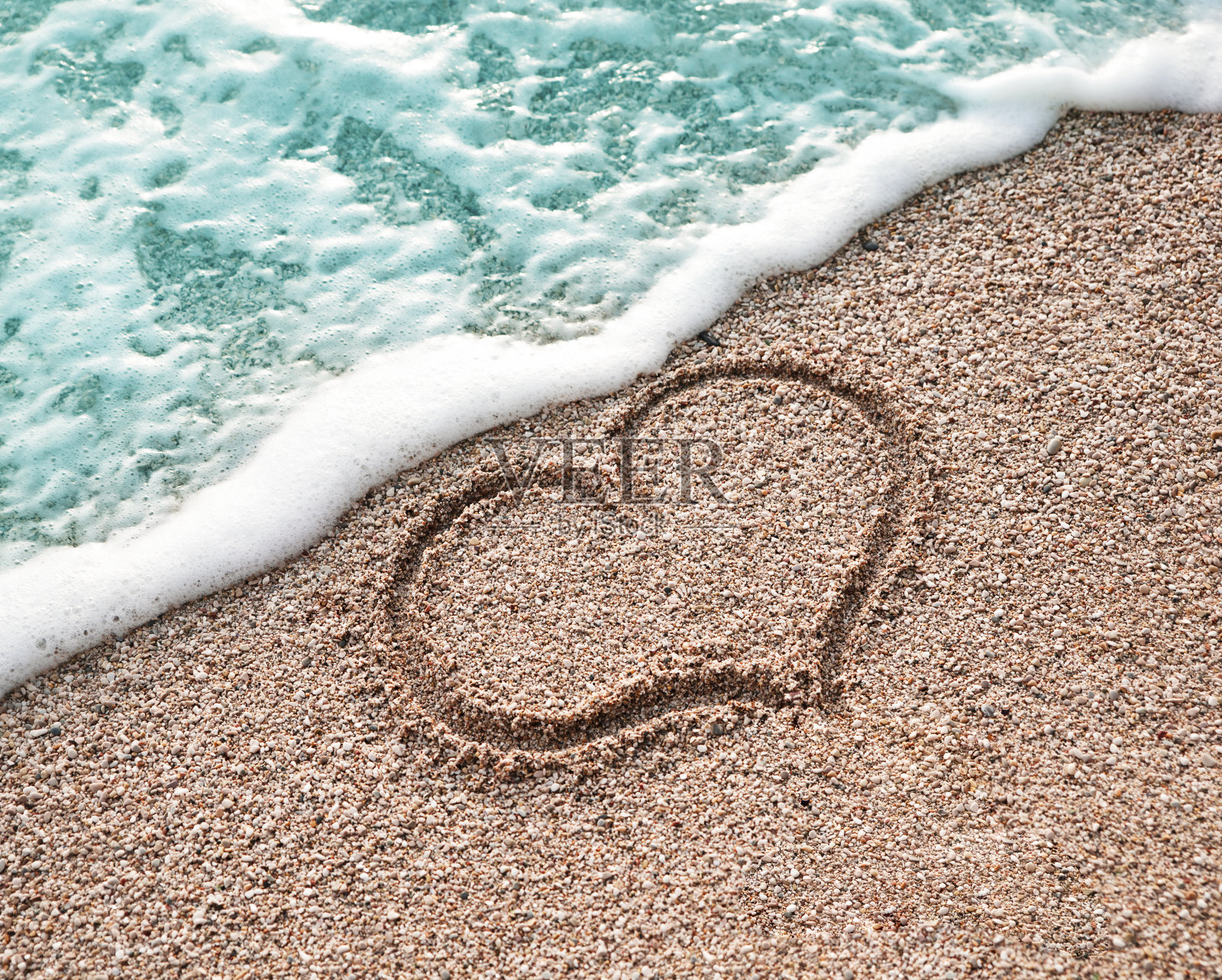 心画在沙滩上照片摄影图片