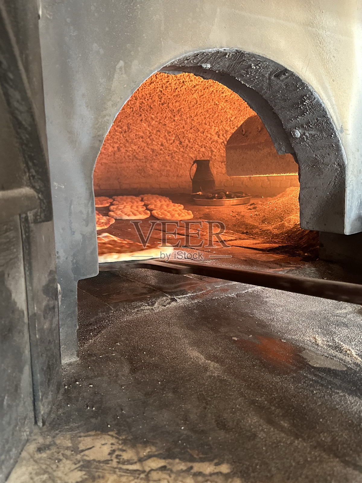 Taş fırın ekmek pişirme照片摄影图片