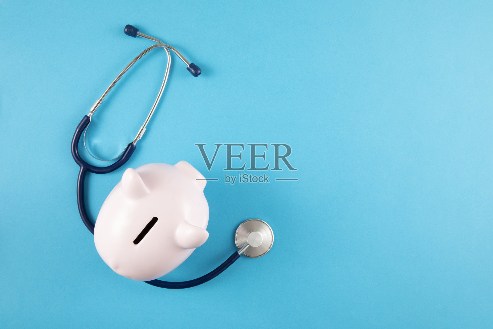 蓝色背景听诊器照片摄影图片