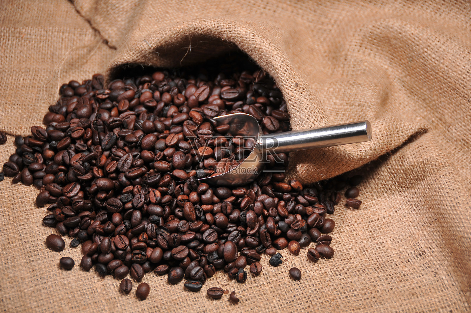 咖啡豆和勺子照片摄影图片